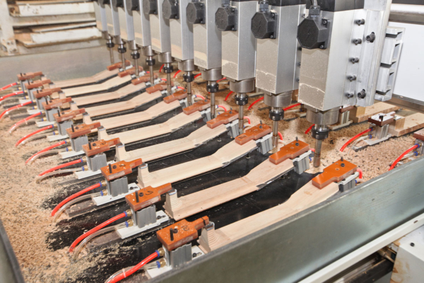 CNC Machine Carving the Neck Shape